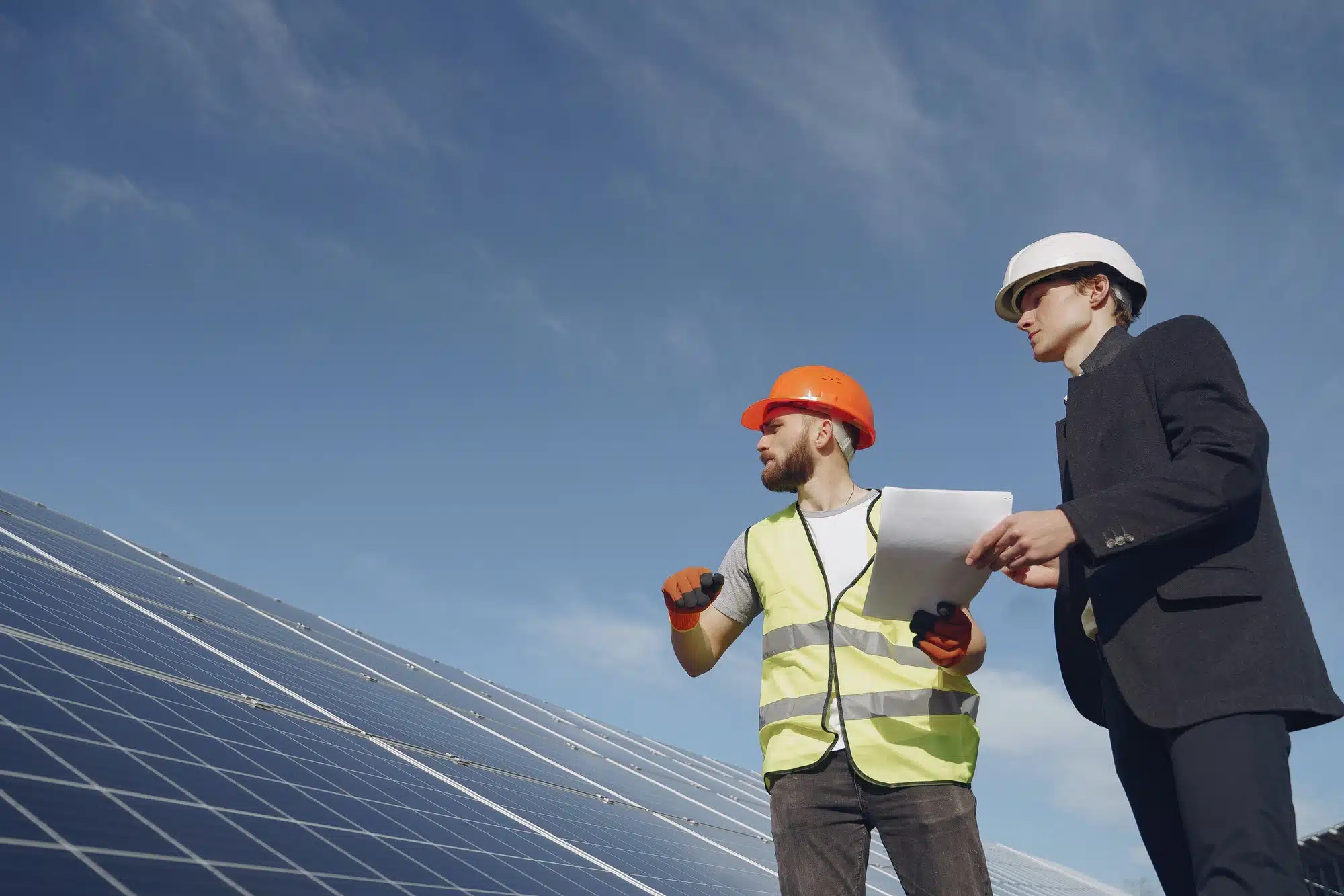 foreman and businessman at solar energy station